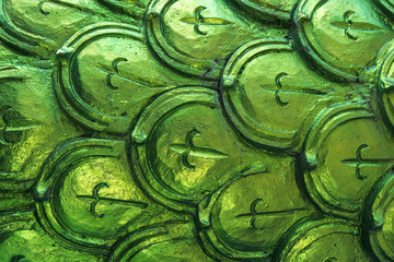 Seamless pattern of intenese green fish scale ornaments. © pirke