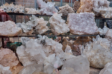 Crystal quartz mineral stones on the shelves in the local mountain shop.