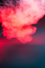 Colorful smoke on a black background closeup