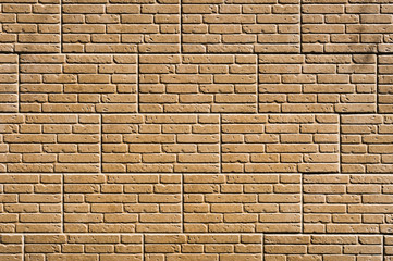 A tile imitating a brickwork of beige color. Textured background