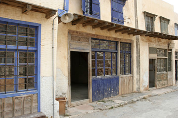 Fototapeta premium The facade of the abandoned house on the small Mediterranean island Spinalonga near Crete.