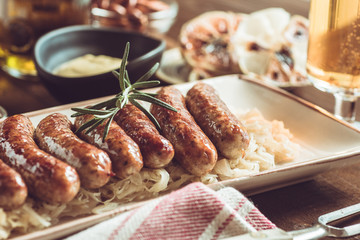 Traditional German Grilled Sausages with Cabbage Salad, Mustard and Beer