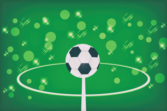 soccer ball on abstract green background