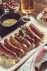 Traditional German Grilled Sausages with Cabbage Salad, Mustard and Beer