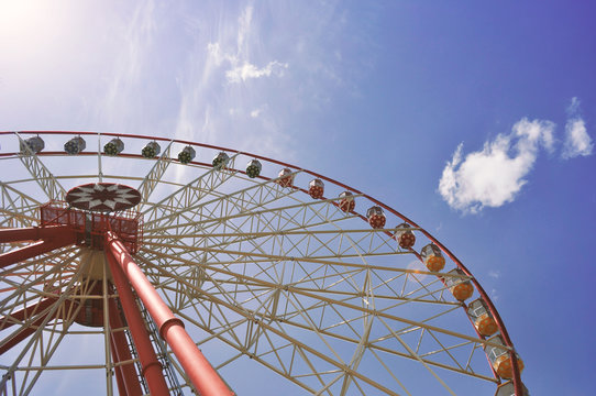 high ferris wheel on blue sky background