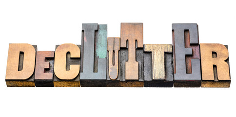 declutter word abstract in wood type