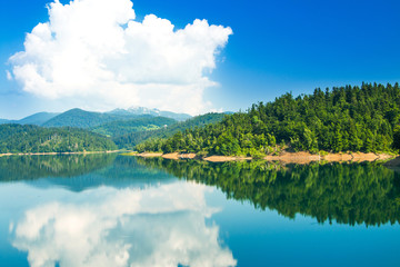 Croatian mountain landscape, region Gorski kotar, Lokvarsko lake with Risnjak mountain in background, reflection in watter