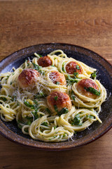 Spaghetti with spinach and chicken meatballs. Pasta with meatballs