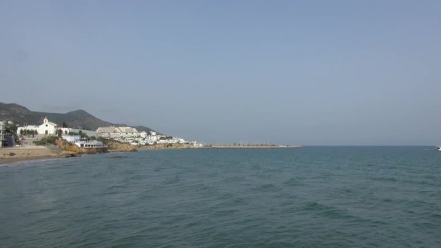 Right to Left Pan of the Beach Front with Buildings
