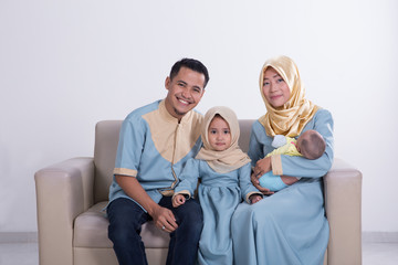 beautiful muslim family with kids together