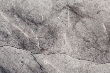 Fragment of stone texture with scratches and cracks. Natural Background.