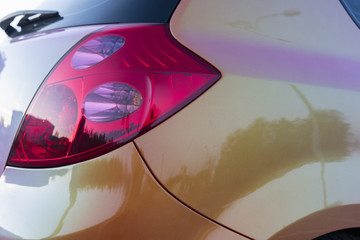 The rear light of a car with variable metallic.