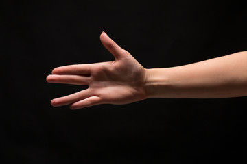 Gesture sign isolated on black background