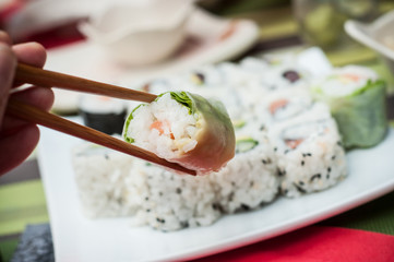 closeup of makis and chopsticks at the chinese restaurant