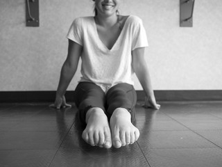 Black and White version of Dancer's pointed bare feet in the dance studio
