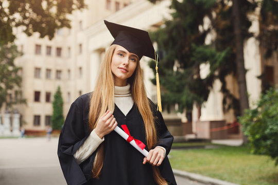 Young serious woman on her graduation day