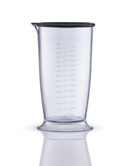 measuring beaker on a white background with reflection. kitchen appliances