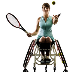 one caucasian young handicapped tennis player woman in welchair sport tudio in silhouette isolated on white background