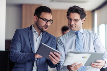 Business team members preparing a project together