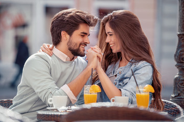 Man and woman dating in cafe