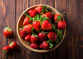 strawberry wooden plate spoon Vintage background
