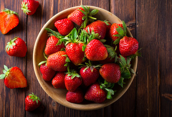 strawberry wooden plate spoon Vintage background
