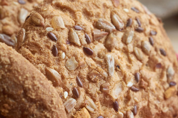 Vegan crunchy cookies with sunflower, flax seeds and sesame seeds isolated. Macro view