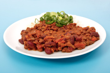 Indian legume hash with rice on a blue