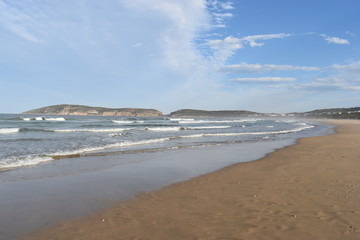 Wonderful beach with Robberg Nature Reserve in background in Plettenberg Bay, South Africa