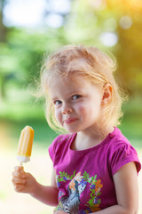 little girl enjoying an ice