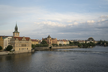 A panoramic view of Moldava river in the center of the city at sunset in Prague, Czeche Republic