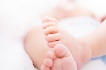 Fototapeta na wymiar closeup of newborn baby feet. Template for baby book or baby photo album