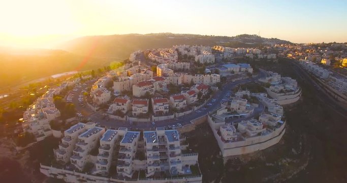 Aerial Shot Of Jerusalem Settlements Neighborhoods At Sunset Time. eastern Jerusalem occupation territory 