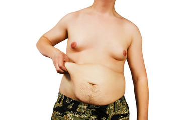 Torso of young fat man holds on fatty fold on the belly, isolated on white background.