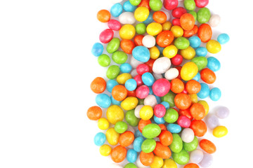 Fototapeta na wymiar Multicolored round candy on a white background. Top view. Isolated.