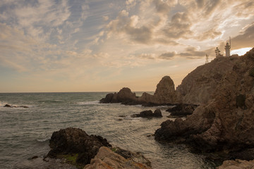The cabo de gata lighthouse at sunset