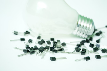 The bulb and the transistors isolated on a white background