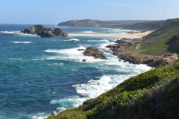 Wonderful landscape with the blue beach at the hiking trail at Robberg Nature Reserve in Plettenberg Bay, South Africa