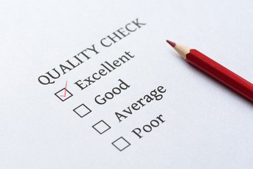 Fototapeta premium red pencil on quality check form
