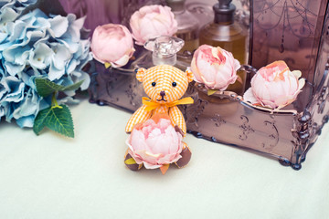 Beautiful toy bears on stylish floral background, shabby chic idea with Teddy bears