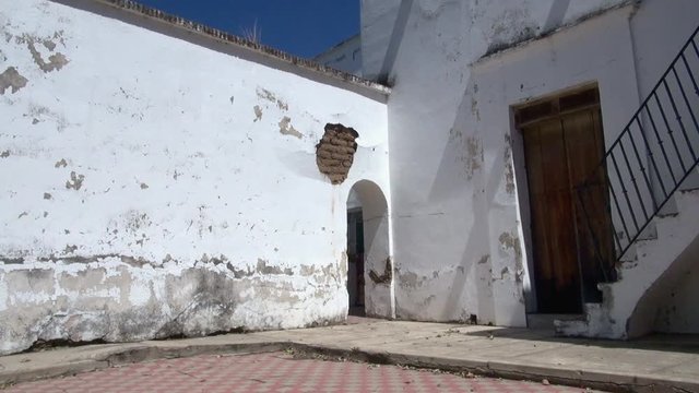 White Building In Tequila Mexico With Wooden Door