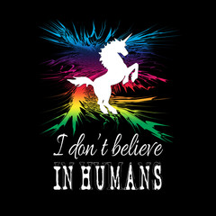 I don't believe in humans text design design with unicorn silhouette and rainbow splash decoration on black background © anasztazia