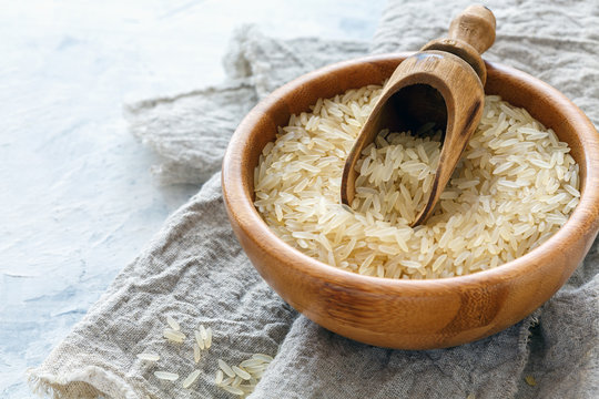 Steamed long rice in a wooden bowl.