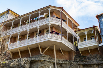 Old sulfur Baths in Abanotubani district with wooden carved balconies in the Old Town of Tbilisi Georgia.