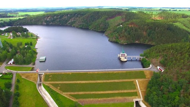 The Hracholusky dam with water power plant. The water reservoir on the river Mze. Source of renewable energy and popular recreational area in Western Bohemia. Czech Republic, Europe.