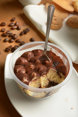 portion of tiramisu in the cup - traditional Italian dessert