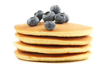Fototapeta na wymiar Tasty pancakes with blueberries isolated on white