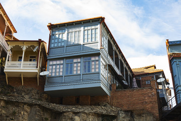 Old sulfur Baths in Abanotubani district with wooden carved balconies in the Old Town of Tbilisi Georgia.