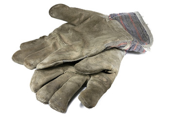 schmutzige Arbeitshandschuhe isoliert auf wei&szlig;em Hintergrund