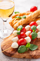 Caprese skewers and grissini bread